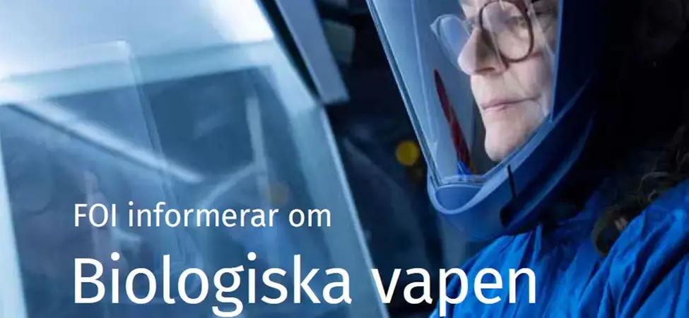 Kvinna i laboratorium.